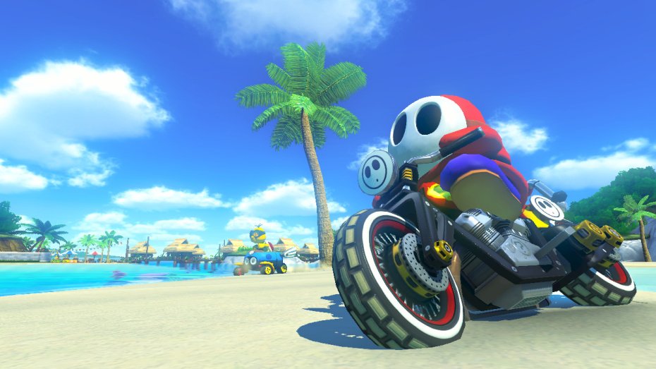 Mario Kart 8 kurvailee trailereilla ja sateenkaaritien kuvilla