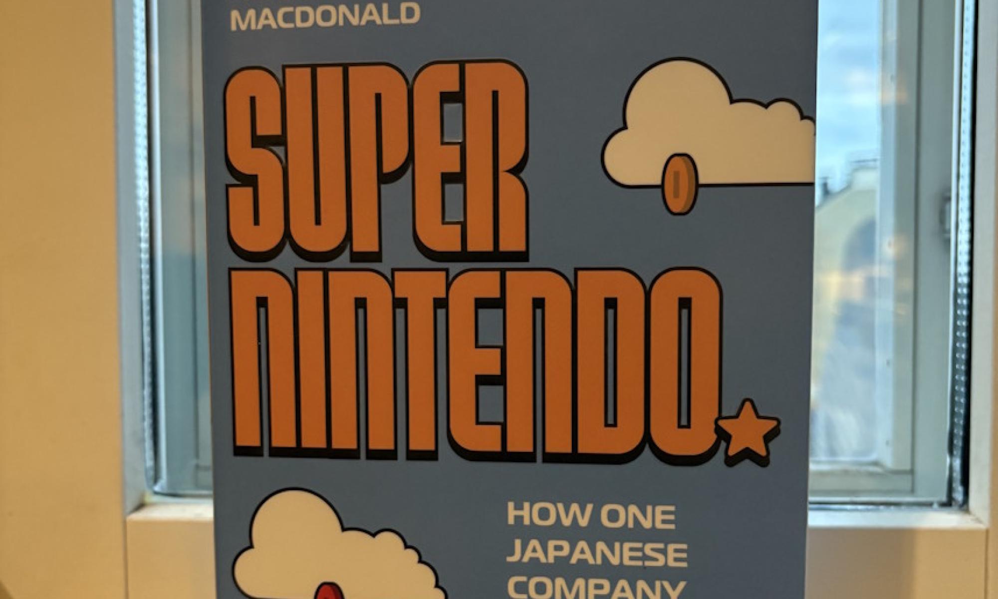 Super Nintendo Keza MacDonald kirja ja kolikko