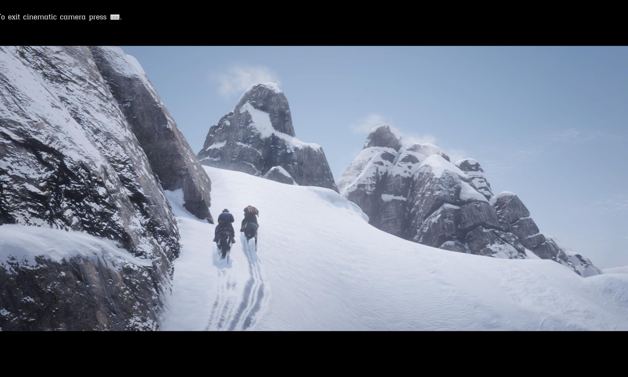 Red Dead Redemption 2 - Kaksi ratsastajaa lumisella vuorenrinteellä
