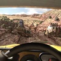 MotorStorm, ohjaamonäkymässä mutaa ja vihollisia